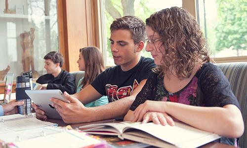 students studying in coffee shop 